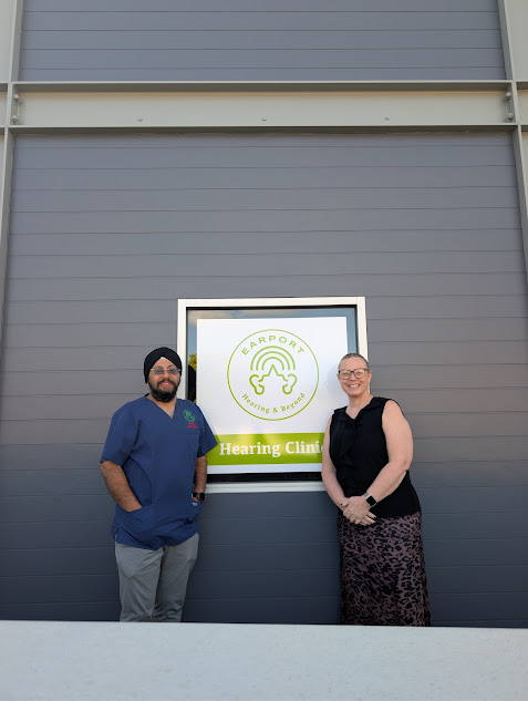 Earport Audiology clinician and patient standing together outside the Earport Hearing Clinic